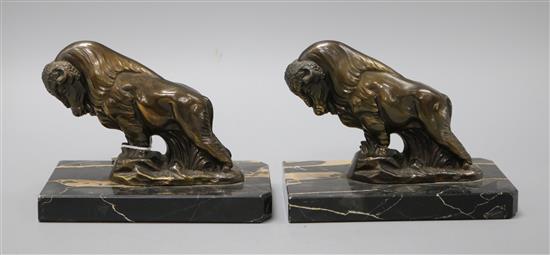 A pair of Art Deco bison bookends, on marble bases height 13cm
